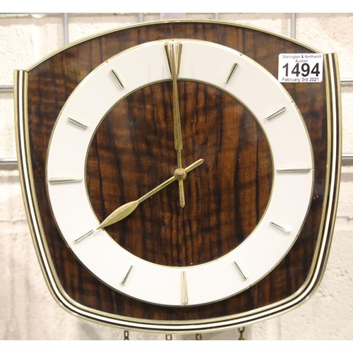 1494 - 1970's chain driven wall clock, lacking glass, weights and pendulum, not working at time of lotting,... 