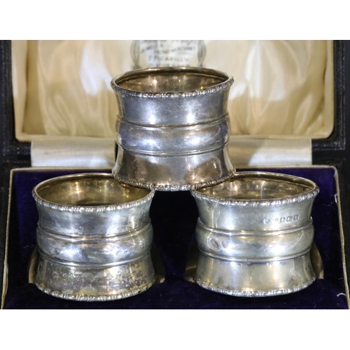 1618 - Three hallmarked silver napkin rings, two cased, 44g. P&P Group 1 (£14+VAT for the first lot and £1+... 