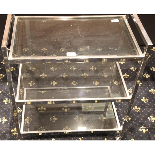 1643 - 1980s chrome and smoked glass drinks trolley, 36 x 62 x 72 cm. Not available for in-house P&P, conta... 