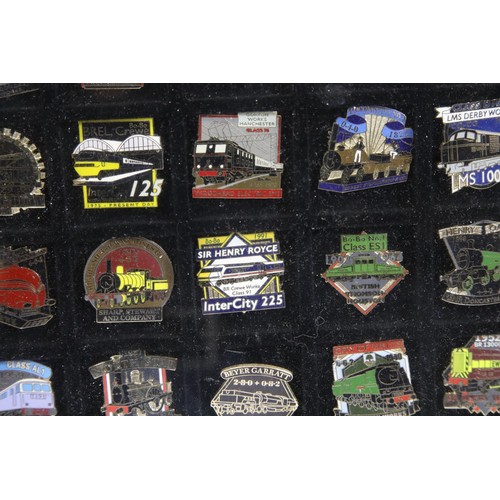 1596 - Glazed display case containing 50 railway related pin badges. P&P Group 3 (£25+VAT for the first lot... 