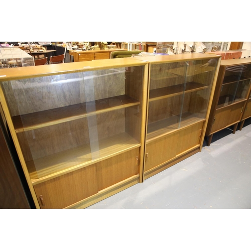 1651 - Pair of vintage Gibbs Furniture bookcases with sliding glass doors and under cupboard with sliding w... 