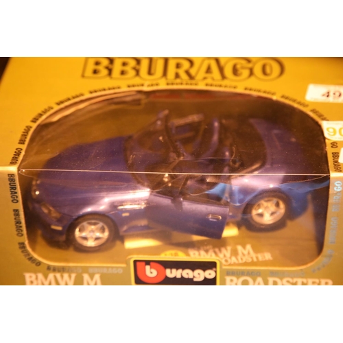 49 - Boxed Burago BMW M Roadster 1996. P&P Group 2 (£18+VAT for the first lot and £3+VAT for subsequent l... 