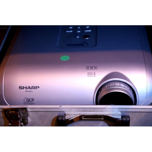 56 - Sharp KR 105-L cased projector with remote (Note Vision). Not available for in-house P&P, contact Pa... 