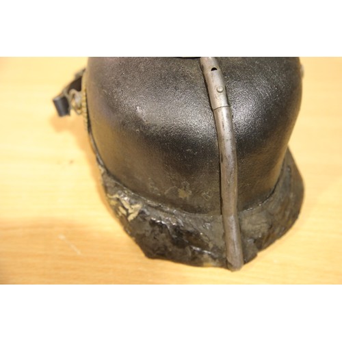 3165 - Imperial German or Prussian type pickelhaube, with leather liner (damaged) and canvas cover numbered... 