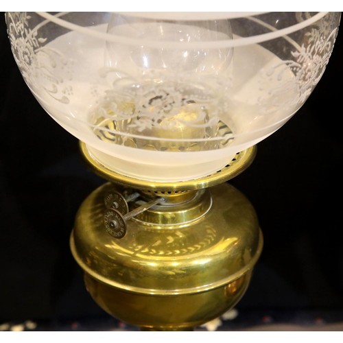 1394 - Two Victorian oil lamps in brass and copper with etched glass shades. Not available for in-house P&P... 