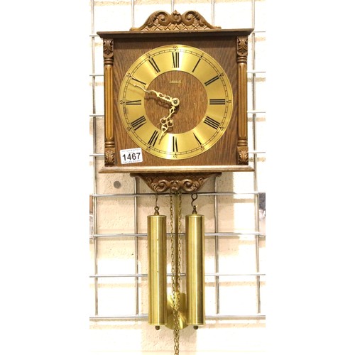 1467 - Primus oak cased twin weight chain driven wall clock, working at time of lotting, dial D: 21 cm. Not... 