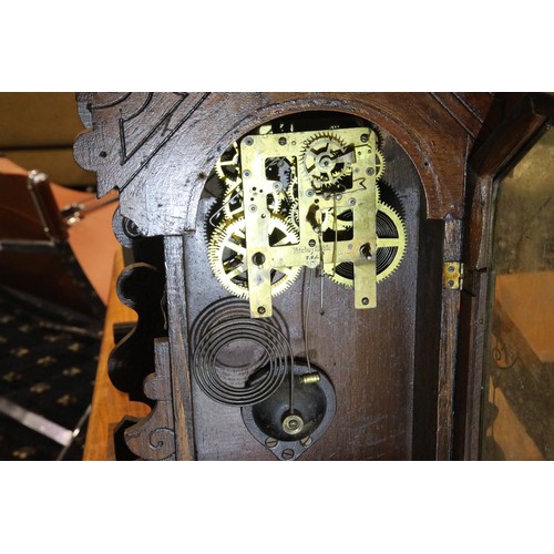 1515 - Three American oak cased mantel clocks including Ansonia, one lacking dial, each H: 58 cm. Not avail... 