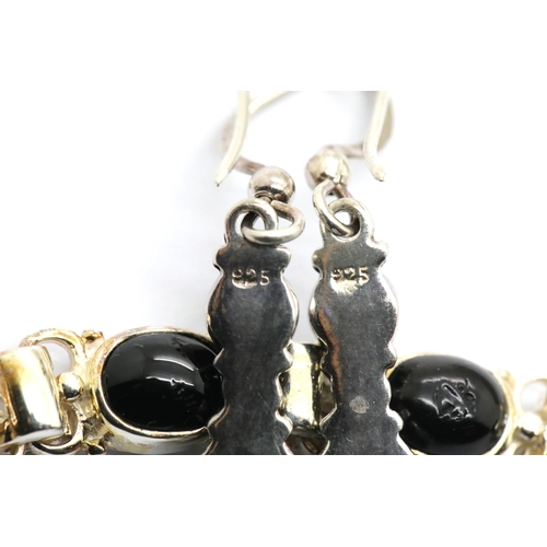 1039 - Boxed Whitby jet and silver bracelet and earringsset. P&P Group 1 (£14+VAT for the first lot and £1+... 