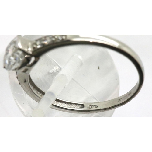 1016 - 9ct white gold stone set ring, size O, 1.7g. P&P Group 1 (£14+VAT for the first lot and £1+VAT for s... 