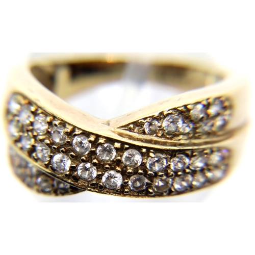 25 - 9ct gold and diamond crossover ring, size L, 4.29g. P&P Group 1 (£14+VAT for the first lot and £1+VA... 