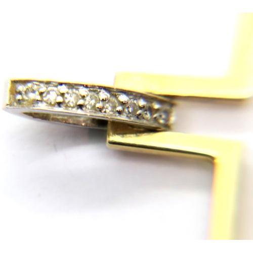 32 - 18ct gold, diamond set cross, 1.1g. P&P Group 1 (£14+VAT for the first lot and £1+VAT for subsequent... 