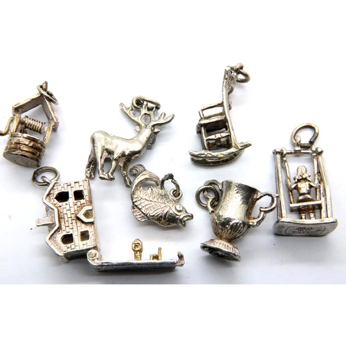 45 - Seven hallmarked silver charms. P&P Group 1 (£14+VAT for the first lot and £1+VAT for subsequent lot... 