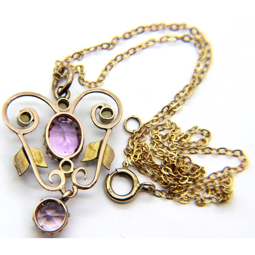 8 - Unmarked gold Edwardian amethyst and seed pearl pendant on a fine 9 ct gold chain. 3.3g.  P&P Group ... 