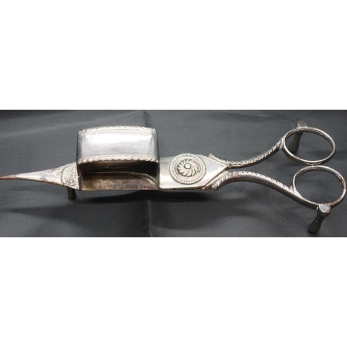 102 - Hallmarked silver small toast rack and a plated candle snuffer. P&P Group 1 (£14+VAT for the first l... 