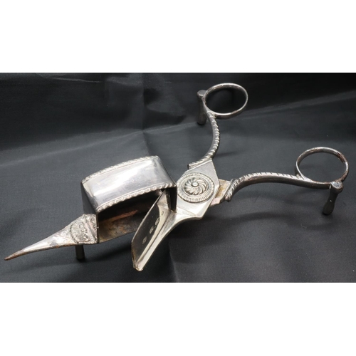 102 - Hallmarked silver small toast rack and a plated candle snuffer. P&P Group 1 (£14+VAT for the first l... 