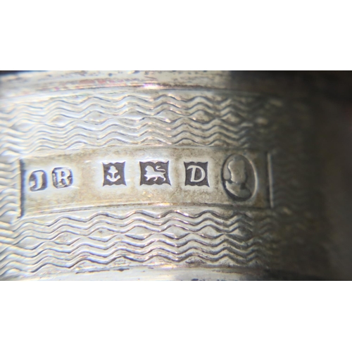 108 - Four hallmarked silver napkin rings, 69g. P&P Group 1 (£14+VAT for the first lot and £1+VAT for subs... 