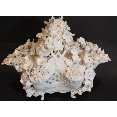 294 - 19thC Meissen flower encrusted reticulated basket, L: 26 cm. Not available for in-house P&P, contact... 