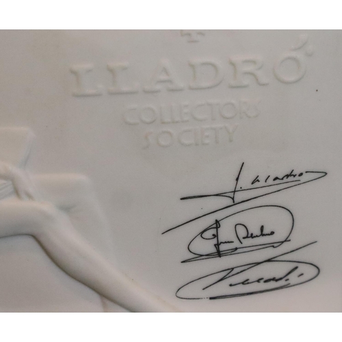 298 - Lladro Society glazed scroll form plaque, H: 17 cm with a Lladro bisque collectors society plaque. P... 