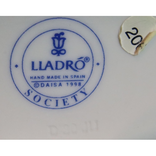 298 - Lladro Society glazed scroll form plaque, H: 17 cm with a Lladro bisque collectors society plaque. P... 