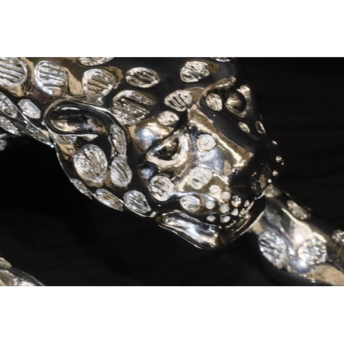 321 - Large silver coloured leopard figurine, l: 95 cm. P&P Group 3 (£25+VAT for the first lot and £5+VAT ... 