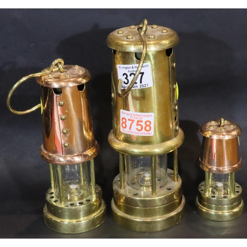 327 - Three reproduction copper and brass colliery lamps, tallest H: 21 cm. P&P Group 3 (£25+VAT for the f... 