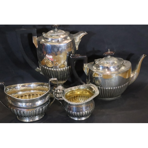 333 - Matched silver plated four piece tea service including Walker and Hall. Not available for in-house P... 