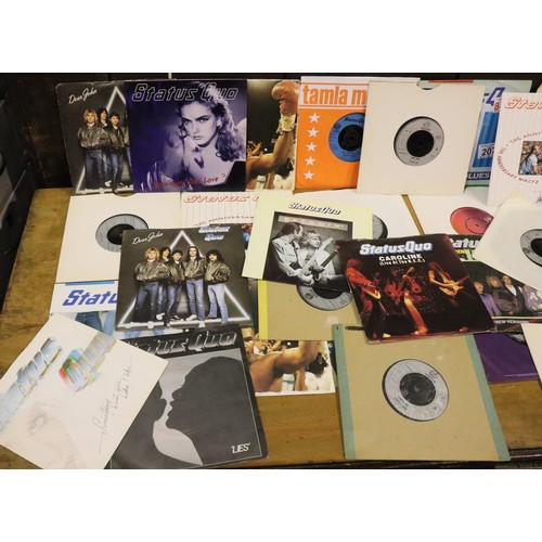 207 - Thirty Status Quo singles. P&P Group 2 (£18+VAT for the first lot and £3+VAT for subsequent lots)