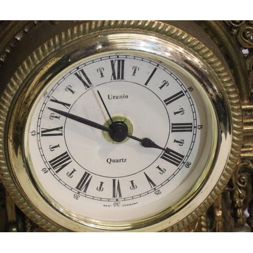 362 - Contemporary brass cased mantel clock with quartz movement with a pair of five sconce garnitures. No... 