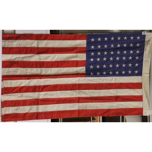 451 - US Army Stars and Stripes flag with 48 stars dated 1944, each panel has been individually sewn toget... 