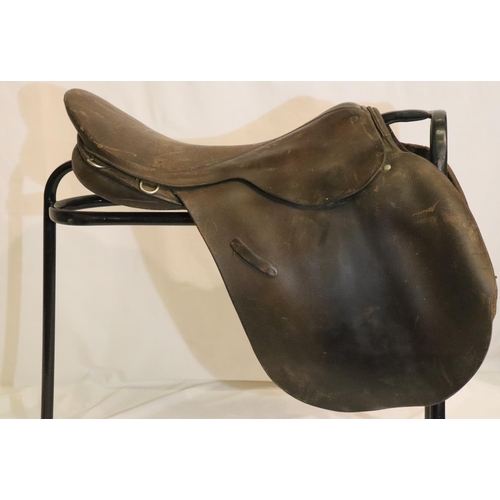 498 - Paul Jones black leather saddle with a further brown leather saddle. Not available for in-house P&P,... 