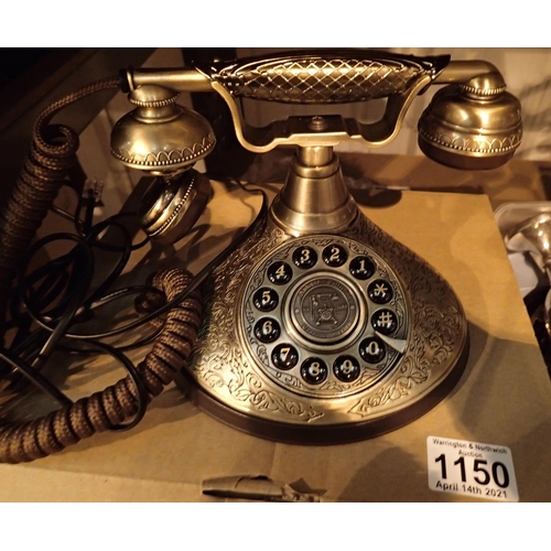 1150 - The Duchess, push button telephone with a solid, brass finish and traditional cloth handset curly co... 