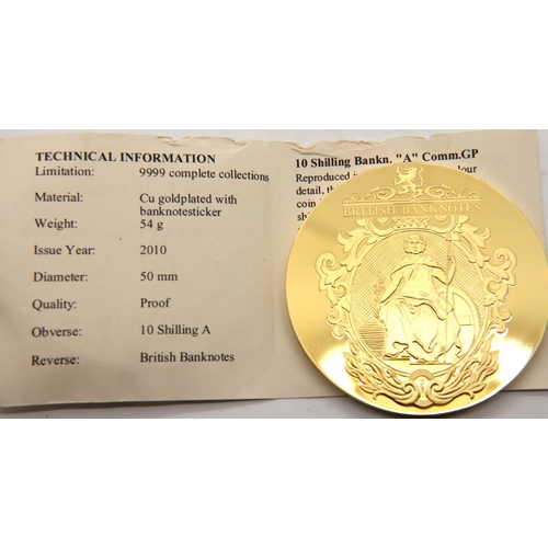 2441 - Three enamelled British banknotes gold plated medallions. P&P Group 1 (£14+VAT for the first lot and... 