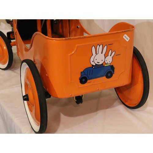 349 - Orange Miffy metal pedal car. 82 cm long, seat 22cm off the ground.  In working order at time of lot... 