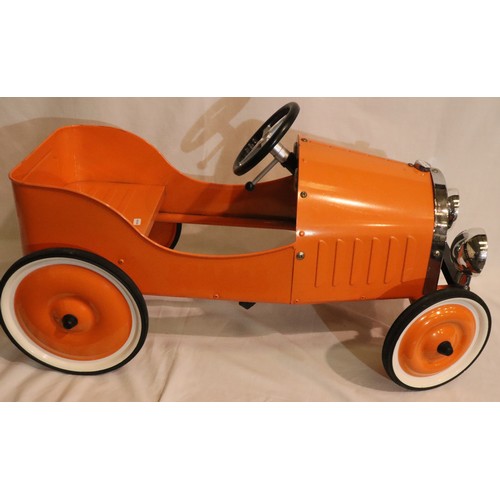 349 - Orange Miffy metal pedal car. 82 cm long, seat 22cm off the ground.  In working order at time of lot... 