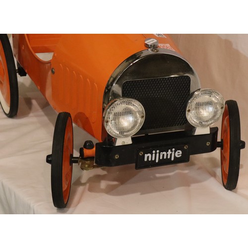 349 - Orange Miffy metal pedal car. 82 cm long, seat 22cm off the ground.  In working order at time of lot... 