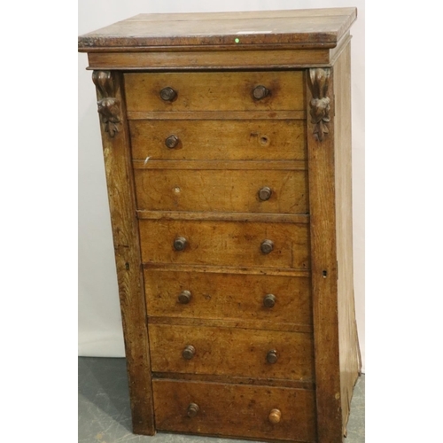 526 - 19thC oak Wellington chest, unusually fitted with a secretaire type desk and five further drawers fo... 