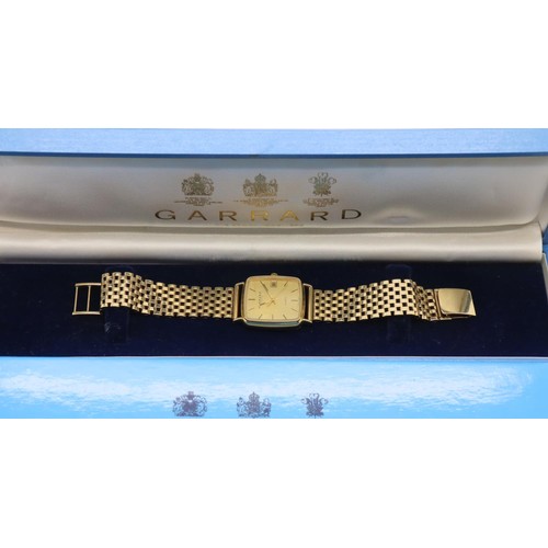 70 - Garrard 9ct gold quartz wristwatch on a 9ct gold bracelet with box and papers, inner and outer box. ... 