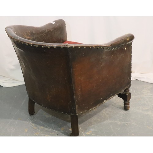 535 - 1920s studded brown leather club chair with upholstered seat and oak twist supports, 68 x 69 x 70 cm... 