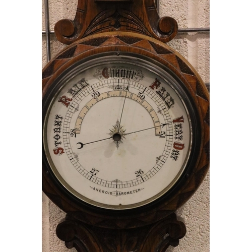 367 - Victorian oak framed aneroid barometer with thermometer. Not available for in-house P&P, contact Pau... 