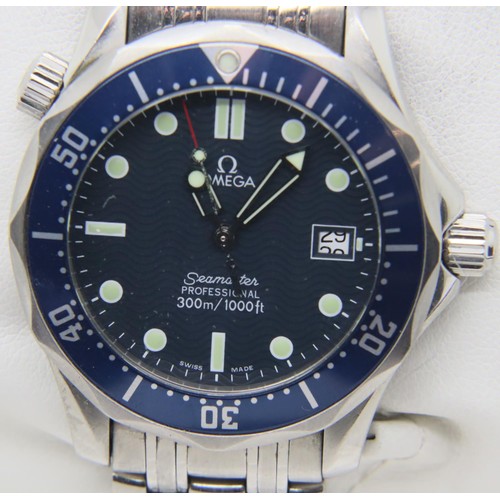 69 - Omega mid size Seamaster Professional 300M quartz wristwatch in steel, with a blue-wave dial, blue b... 