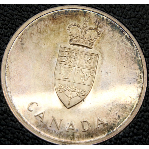 3221 - 1967 - Canada silver centenary coin in leather case.  P&P Group 1 (£14+VAT for the first lot and £1+... 