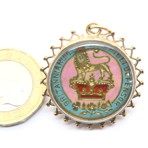 72 - 9ct gold bound pendant with enamel and gilt shilling. P&P Group 1 (£14+VAT for the first lot and £1+... 