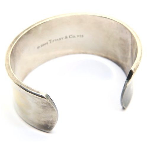 89 - Silver Tiffany & Co hallmarked 2001 bangle. P&P Group 1 (£14+VAT for the first lot and £1+VAT for su... 