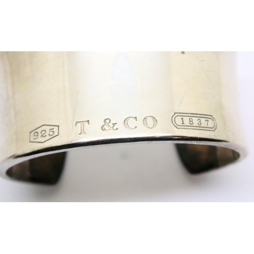 89 - Silver Tiffany & Co hallmarked 2001 bangle. P&P Group 1 (£14+VAT for the first lot and £1+VAT for su... 