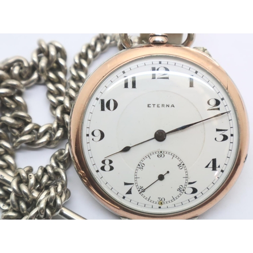 112 - Eterna silver and gold pocket watch 75g (working at lotting) and a silver double albert chain 65g. P... 