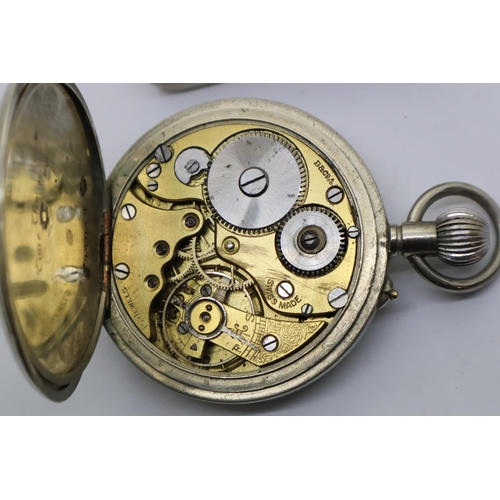 113 - White metal crown wind pocket watch. Working at lotting. P&P Group 1 (£14+VAT for the first lot and ... 