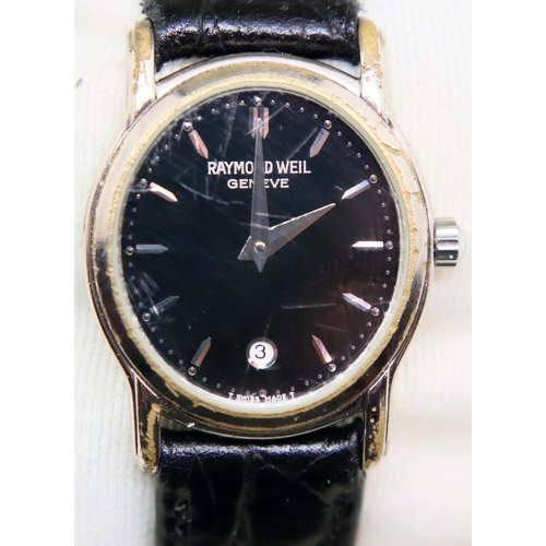 137 - Raymond Weil ladies wristwatch with black dial and leather strap in original box. P&P Group 1 (£14+V... 