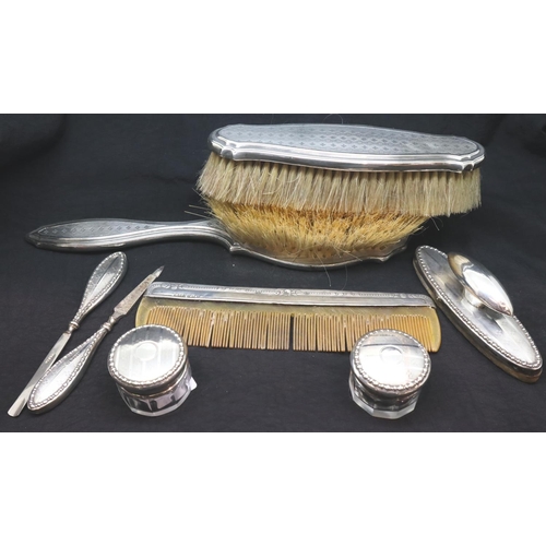 144 - Silver dressing table and manicure set of eight items. P&P Group 3 (£25+VAT for the first lot and £5... 