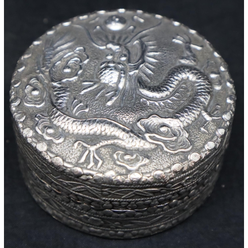 152 - Chinese silver dressing table pot with embossed Dragon chasing pearl to lid. P&P Group 1 (£14+VAT fo... 