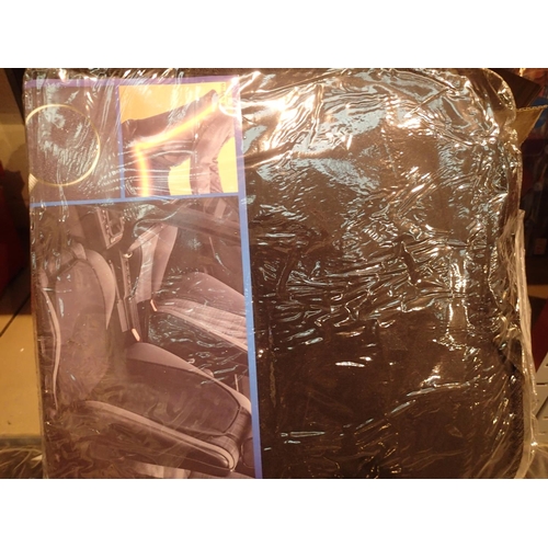 1063 - Quantity of unopened Unitec heated car seat covers. Not available for in-house P&P, contact Paul O'H... 